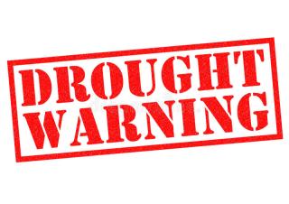 Bold text that is red colored in a red box stating "Drought Warning"